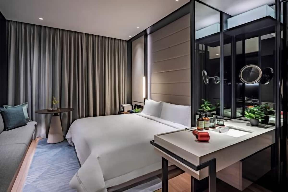 Premium bedding, down duvets, pillow-top beds, in-room safe