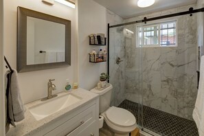 Shower, hair dryer, towels, soap