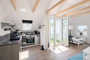 Fridge, oven, stovetop, dishwasher - Charming Top-Floor Apartment with Loggia and Panoramic Views – Pure Peace & Nature (Osteel)