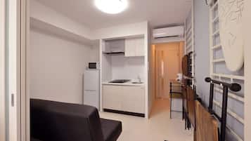 Apartamento conforto | Área de estar | TV de tela plana