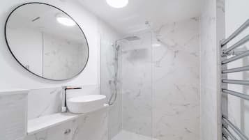 Shower, hair dryer, towels