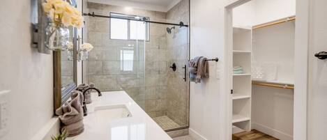 Shower, hair dryer, towels