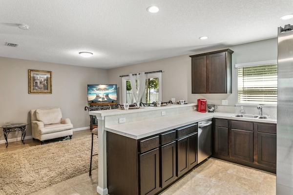 Kitchen with stainless steel appliances and lots of counter space