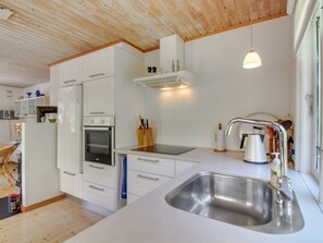 Fridge, high chair, cookware/dishes/utensils