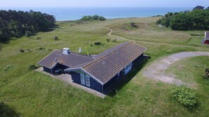A coastal house with a large deck and a view of the sea. - "Kajsa" - 50m from the sea by Interhome (Aakirkeby)
