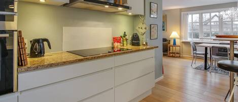 Fridge, microwave, dishwasher, cookware/dishes/utensils