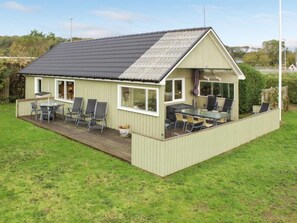 Enjoy dining or relaxing on the deck with a table and chairs.