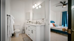 Hair dryer, towels, soap, shampoo