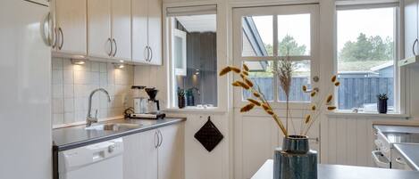 Fridge, microwave, dishwasher, cookware/dishes/utensils