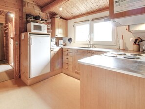 Fridge, microwave, cookware/dishes/utensils