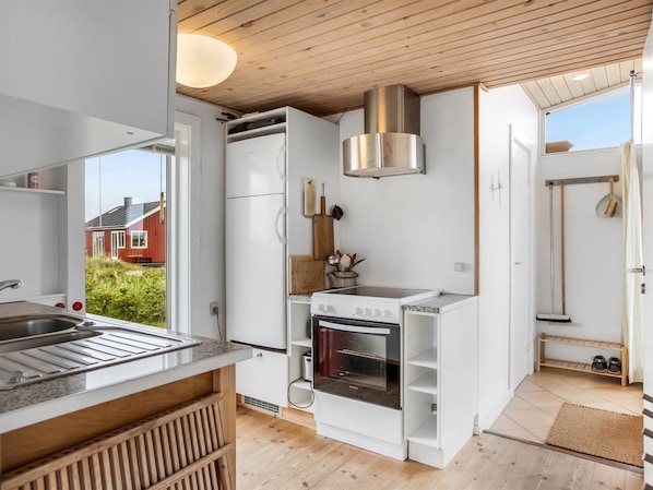 Fridge, highchair, cookware/dishes/utensils