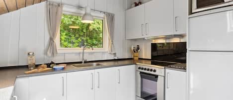 Fridge, microwave, cookware/dishes/utensils