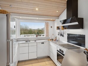 Fridge, microwave, dishwasher, cookware/dishes/utensils