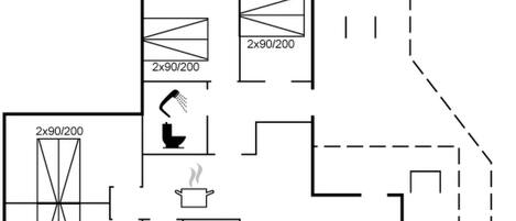 A floor plan with a bathroom, a kitchen, and a living area.