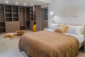 2 chambres, coffres-forts dans les chambres, fer et planche à repasser