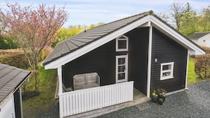 A small, single-story cabin with a porch, a window, and a door. - "Holmwith" - 200m from the sea by Interhome (Aabenraa)