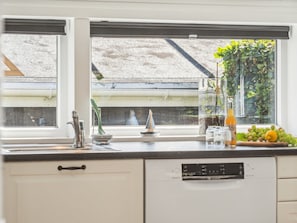 Fridge, microwave, dishwasher, cookware/dishes/utensils