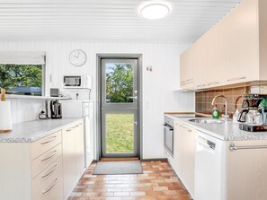 Fridge, microwave, dishwasher, cookware/dishes/utensils
