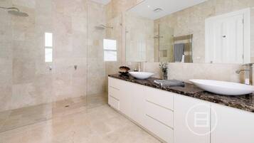 Hair dryer, towels, soap, shampoo