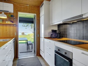 Fridge, microwave, dishwasher, cookware/dishes/utensils