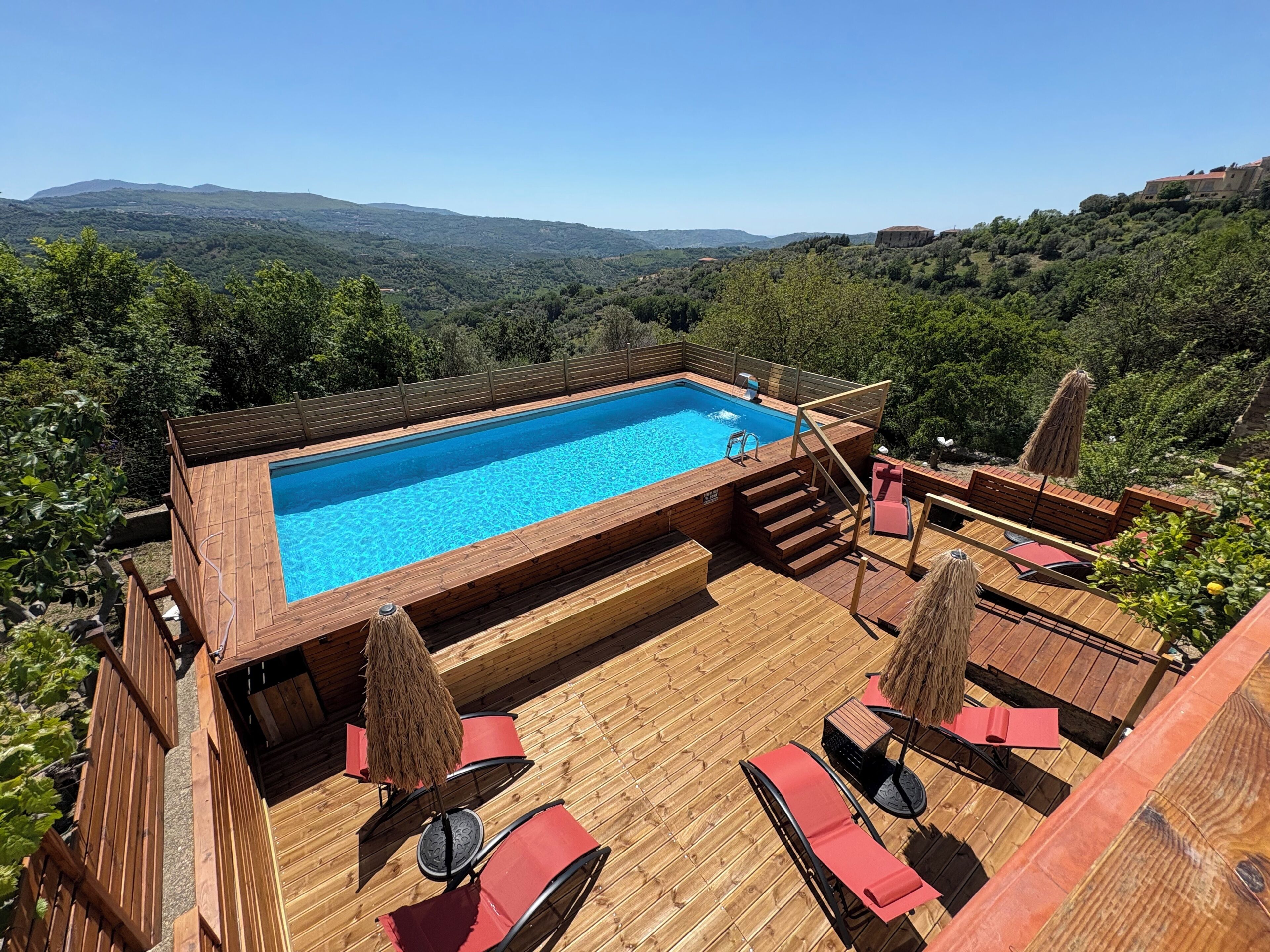 Seasonal outdoor pool, open 9:00 AM to 6:30 PM, pool umbrellas