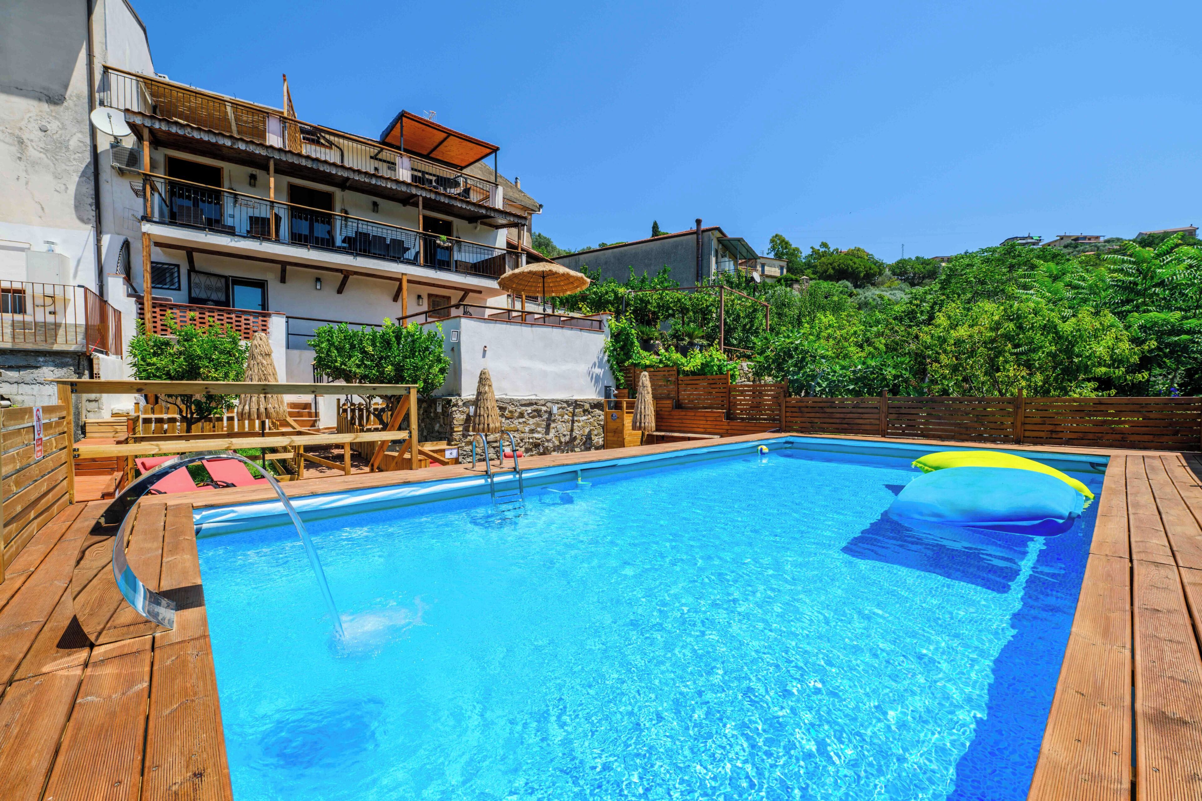 Seasonal outdoor pool, open 9:00 AM to 6:30 PM, pool umbrellas