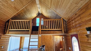 Cabin | Living area | 70-inch flat-screen TV with digital channels, fireplace, DVD player