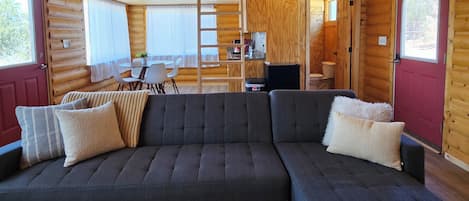 Cabin | Living area | 70-inch flat-screen TV with digital channels, fireplace, DVD player