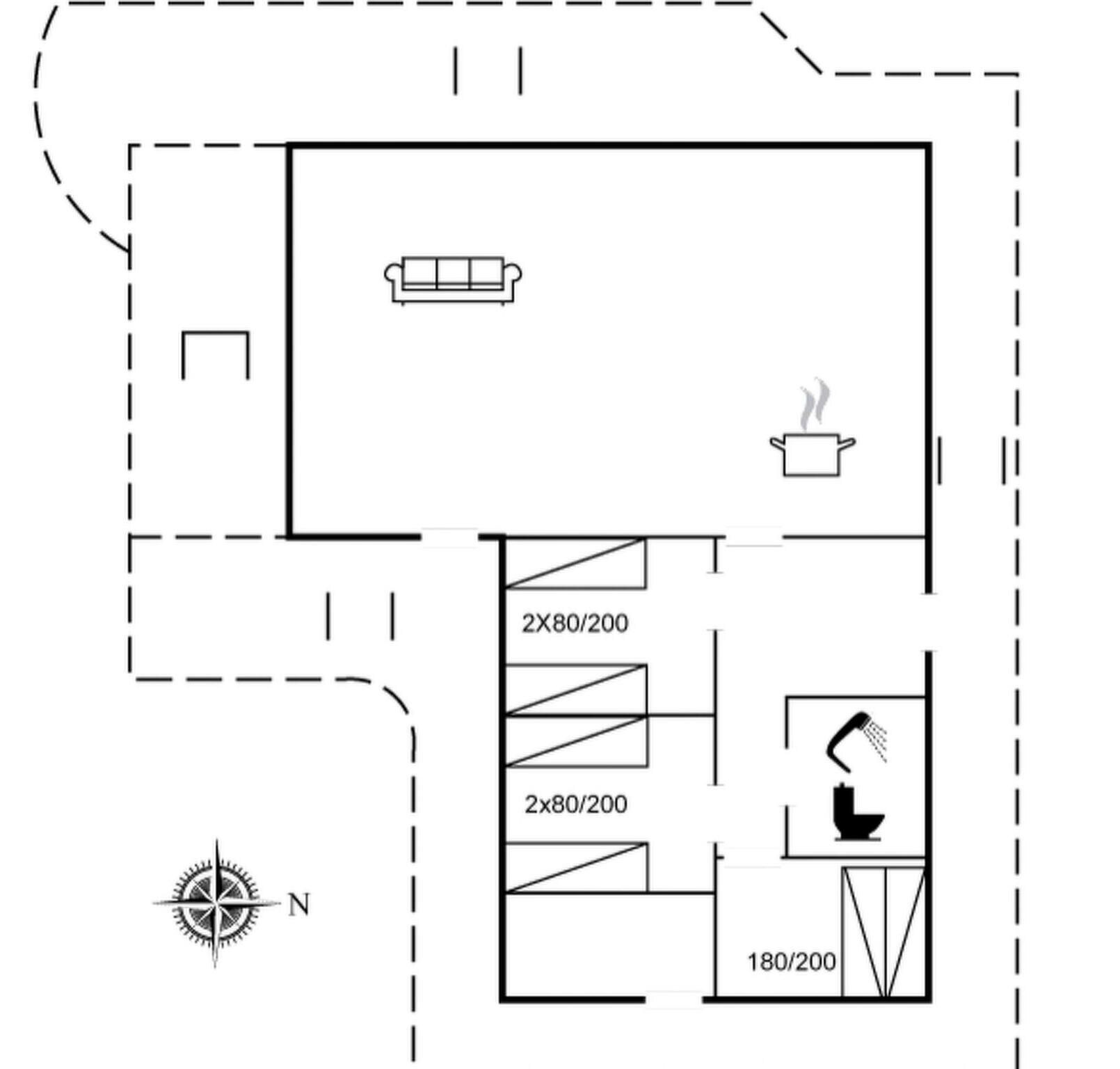 A floor plan with a living area, a kitchenette, and a bathroom.
