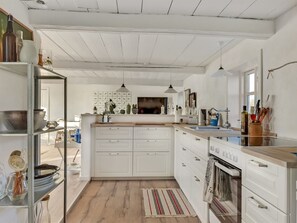 Fridge, oven, high chair, cookware/dishes/utensils
