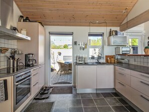 Fridge, microwave, dishwasher, cookware/dishes/utensils