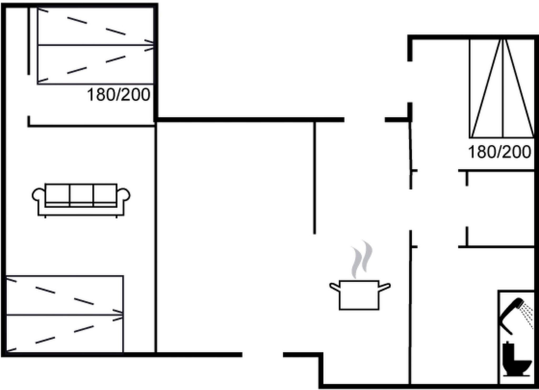 Een plattegrond met een keuken, een eetruimte en een badkamer.