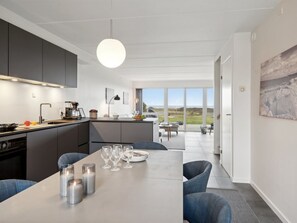 Fridge, dishwasher, highchair, cookware/dishes/utensils