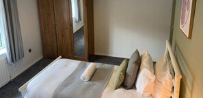 3 dormitorios, tabla de planchar con plancha, wifi gratis y ropa de cama