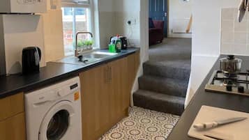 Fridge, microwave, toaster, cookware/dishes/utensils