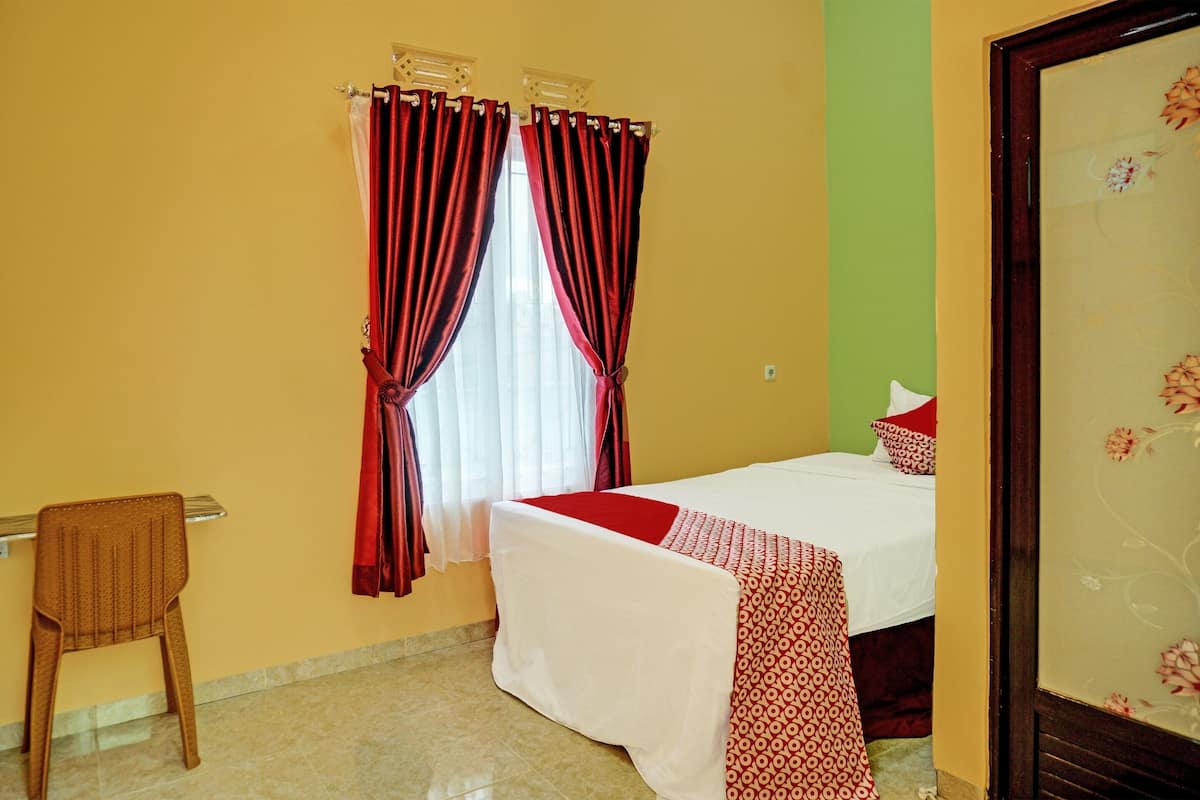 Habitación individual estándar | Espacio para trabajar con laptop, wifi gratis y ropa de cama