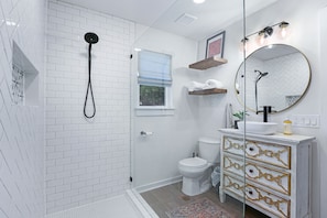 Shower, hair dryer, towels, soap