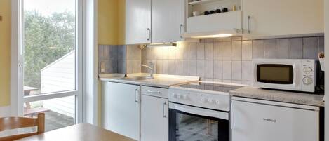 Fridge, microwave, oven, cookware/dishes/utensils