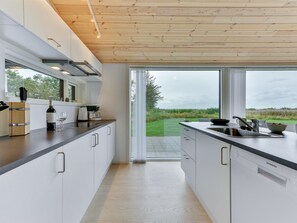 Fridge, microwave, dishwasher, cookware/dishes/utensils