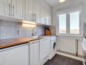 Fridge, oven, high chair, cookware/dishes/utensils