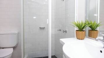 Shower, hair dryer, towels
