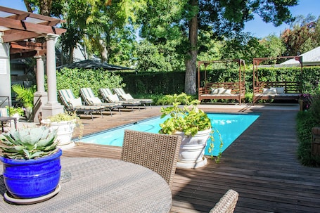 Outdoor pool, pool umbrellas, sun loungers