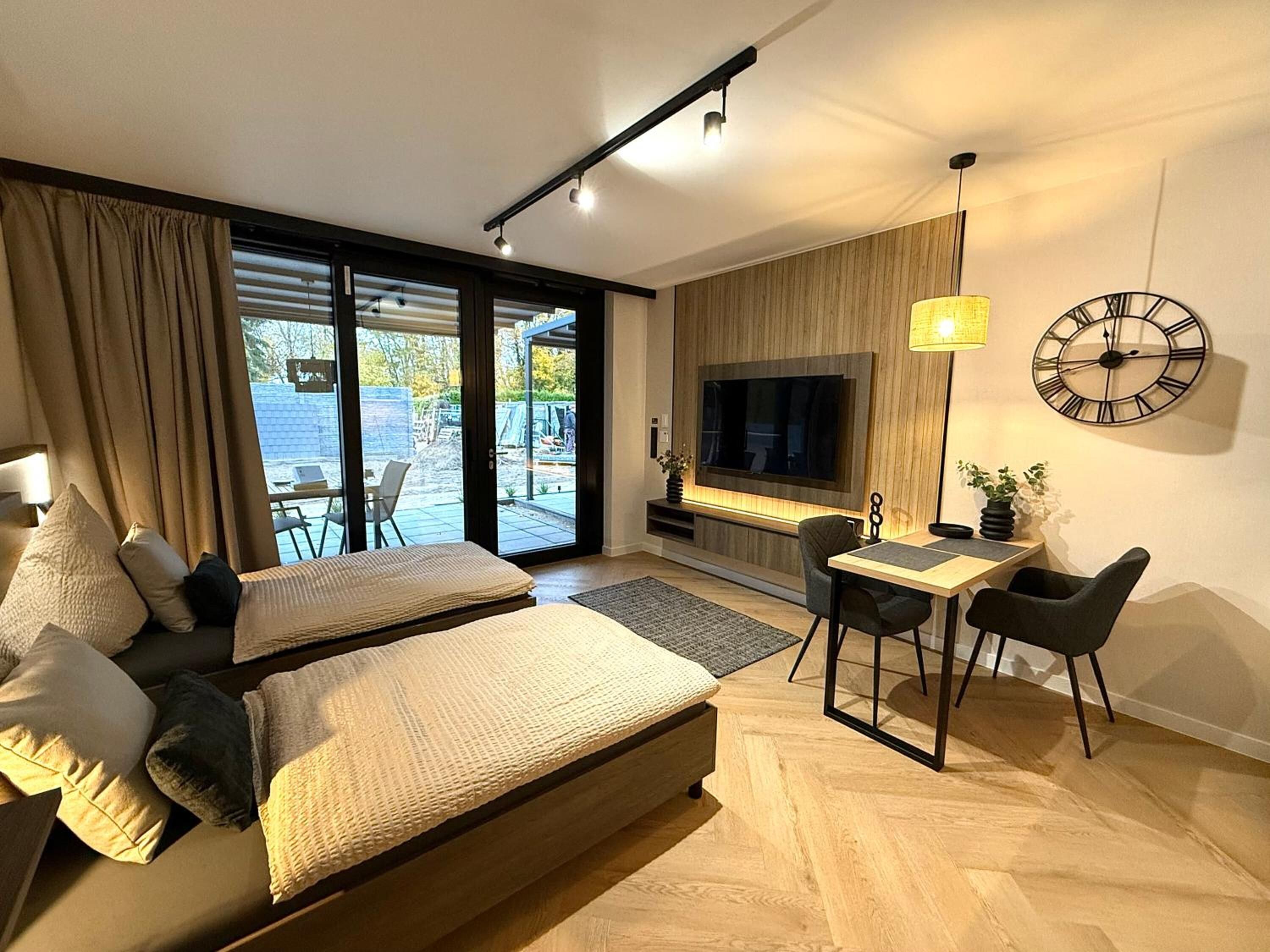 3 bedrooms, blackout drapes, soundproofing, iron/ironing board