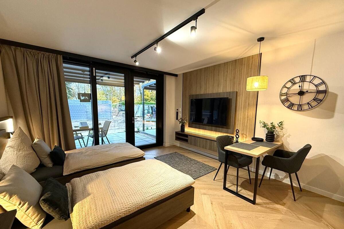 3 bedrooms, blackout curtains, soundproofing, iron/ironing board