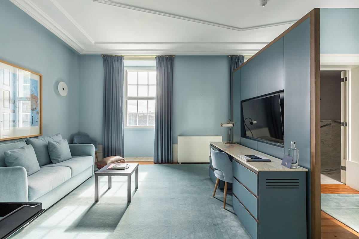 Suite Deluxe | 1 habitación, ropa de cama de alta calidad y edredón