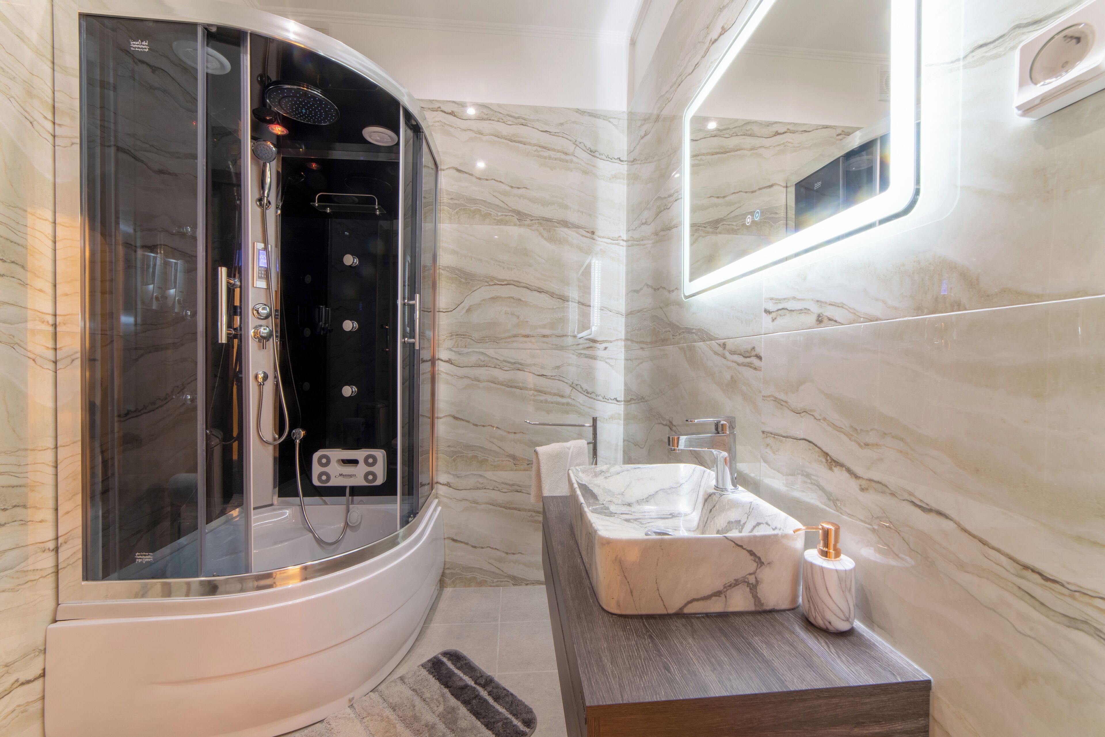 Shower, jetted tub, hair dryer, bathrobes