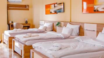 Comfort Room, Multiple Beds, Balcony | Desk, laptop workspace, blackout curtains, soundproofing