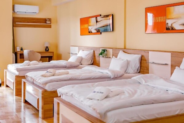 Comfort Room, Multiple Beds, Balcony | Desk, laptop workspace, blackout drapes, soundproofing