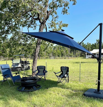 Outdoor dining. Tranquil 4 bedroom fully furnished home located 35 miles from Panama City Beach.