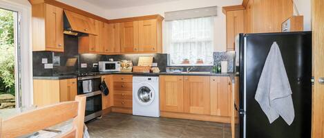 Fridge, electric kettle, toaster, cookware/dishes/utensils